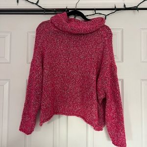 Pink cropped turtleneck sweater
